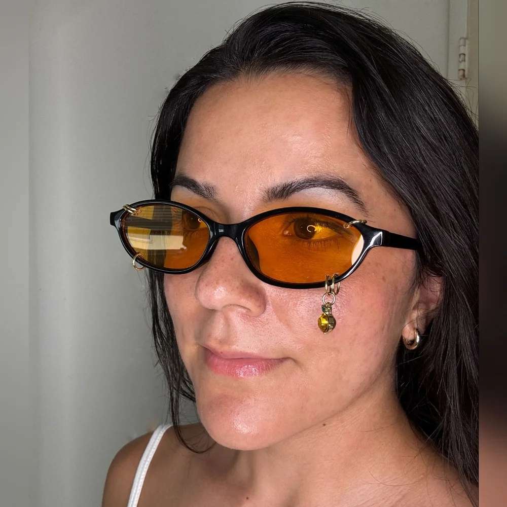 Black Oval Cat Eye Orange Shade Sunglasses Gold Piercings and Orange Fruit Charm - Picture 2 of 5